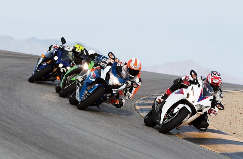 A motorcycle rider practicing braking techniques on a winding road, showcasing focus and control.