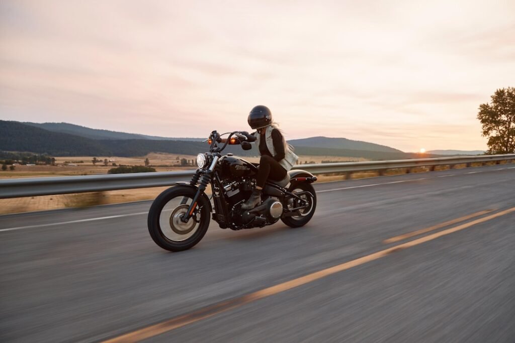 A new rider practicing motorcycle skills in a safe environment, focusing on learning and improvement.