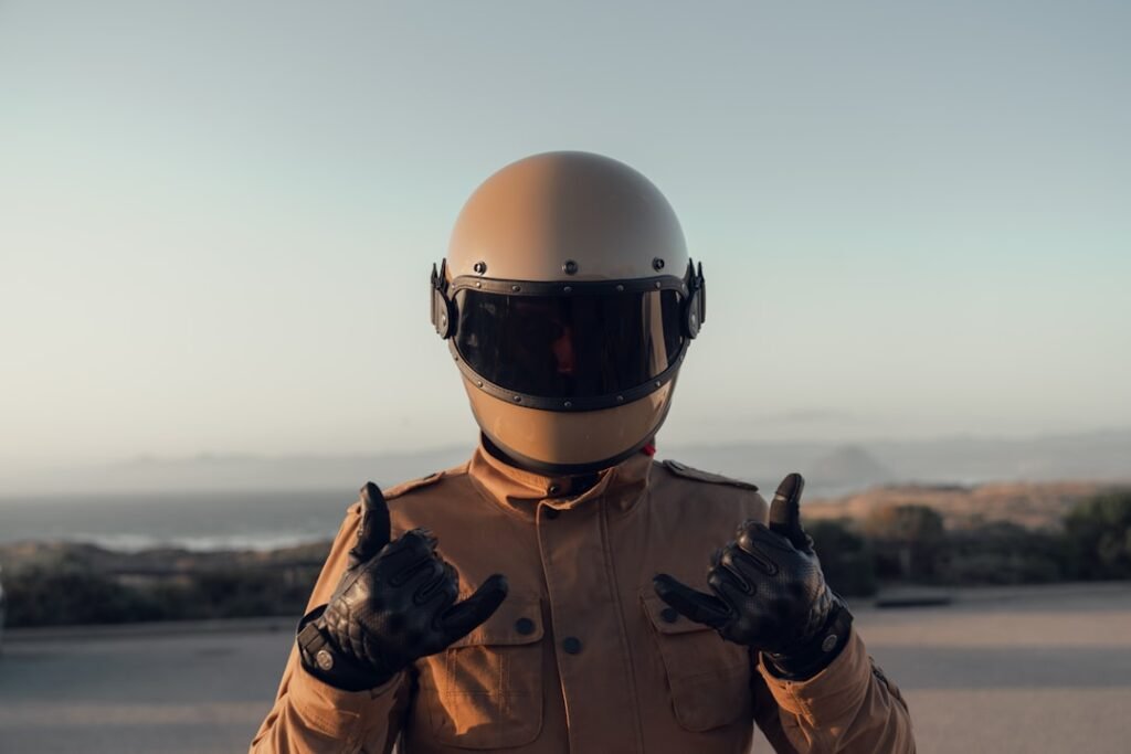 A close-up of various motorcycle helmets showcasing different styles and colors, emphasizing safety features.